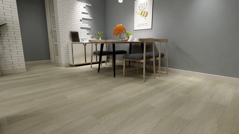 Warm greige SPC floor in a dining area with gray walls